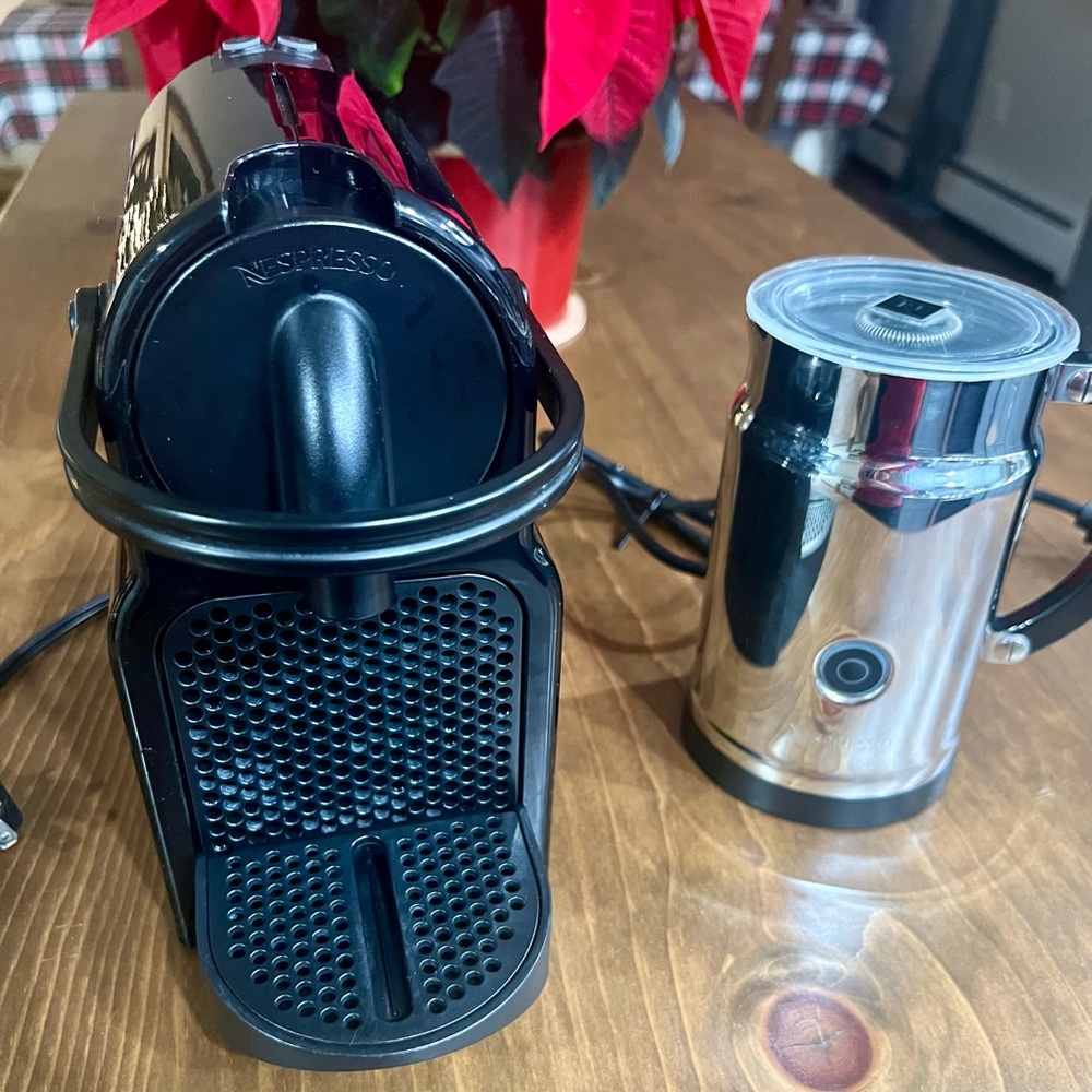 Black Nespresso Machine with Silver Milk Frother